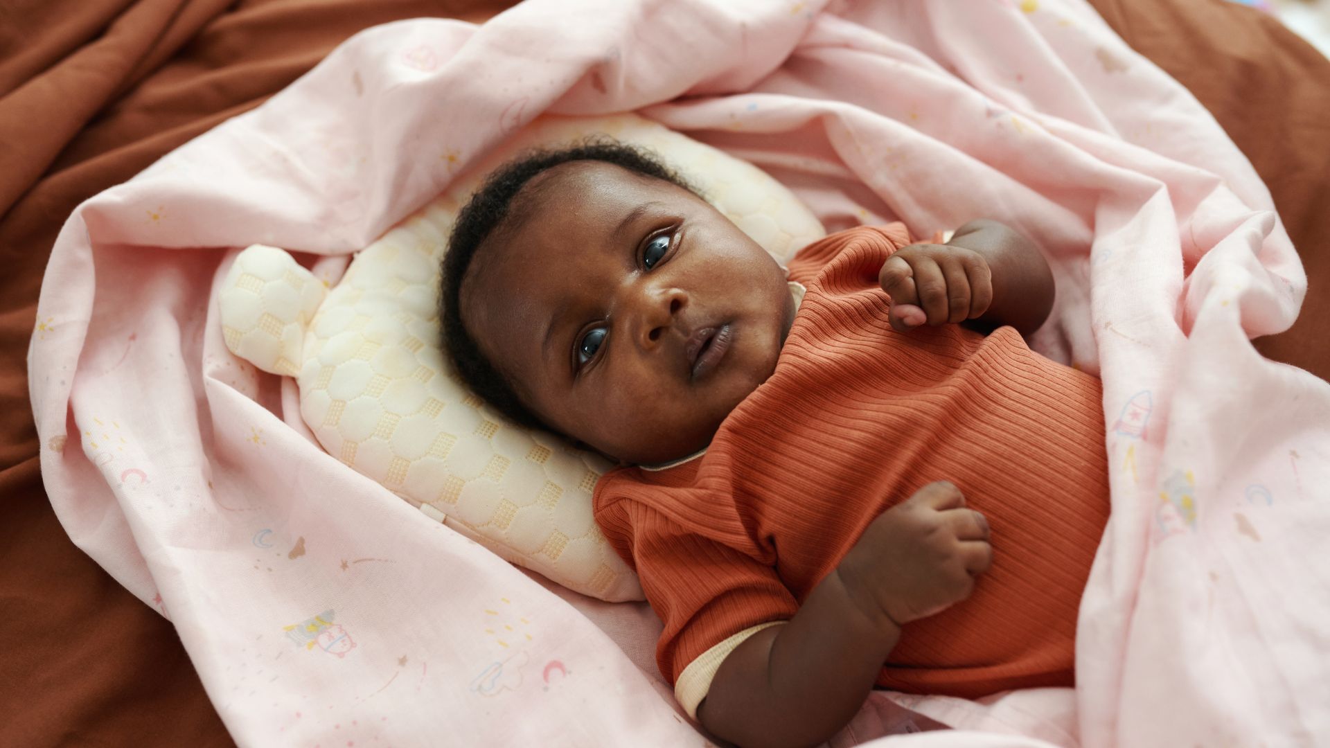 Baby wrapped in blanket